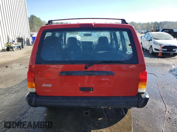 1999 Jeep Cherokee SE with VIN 1J4FT28S6XL515896, listed as a Copart auction lot 83745444 with 192,406 mi miles and Salvage title. Bid and sale history available at DreamBid. Image 6.