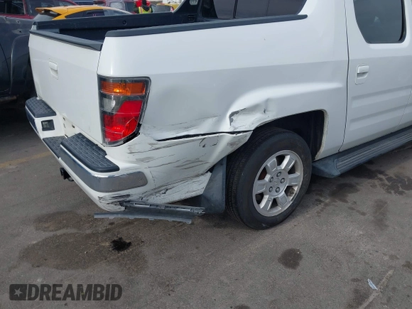 2006 Honda Ridgeline RTL z VIN 2HJYK16586H519593, wystawiony jako IAAI lot #42111678 z przebiegiem 244 962 mil mil oraz . Historia ofert i sprzedaży dostępna na DreamBid. Obrazek 6.
