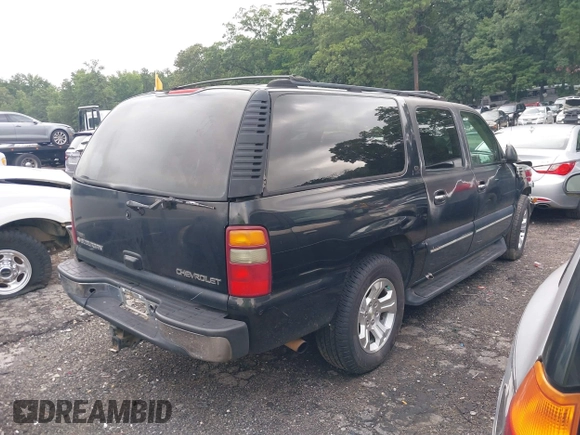 2001 Chevrolet Suburban LS z VIN 1GNEC16T21J217198, wystawiony jako IAAI lot #41779416 z przebiegiem 306 172 mil mil oraz . Historia ofert i sprzedaży dostępna na DreamBid. Obrazek 4.