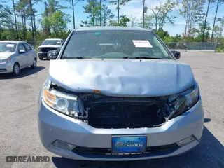 2013 Honda Odyssey Touring with VIN 5FNRL5H94DB069716, listed as a IAAI auction lot 41901369 with 243,492 mi miles. Bid and sale history available at carsss.com. Image 13.