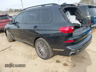 2021 BMW X7 M50i with VIN 5UXCX6C07M9G39230, listed as a IAAI auction lot 41409366 with 63,965 mi miles. Bid and sale history available at carsss.com. Image 3.