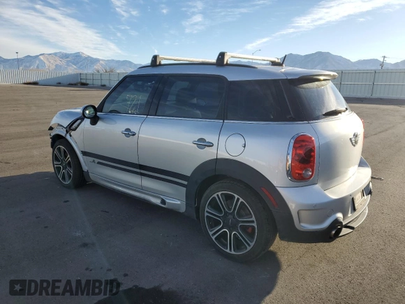 2015 MINI Countryman John Cooper Works with VIN WMWXD1C53FWS34815, listed as a Copart auction lot 74667224 with 94,971 mi miles and Salvage Title. Bid and sale history available at DreamBid. Image 2.