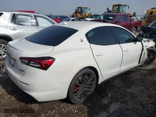 2021 Maserati Ghibli with VIN ZAM57XSA4M1361209, listed as a IAAI auction lot 41716325 with 46,120 mi miles. Bid and sale history available at carsss.com. Image 4.