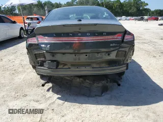 2016 Lincoln MKZ с VIN 3LN6L2G95GR606837, выставлен на аукционе Copart как лот 57356815 с пробегом 67 898 миль миль и Списание • Salvage title. История ставок и продаж доступна на DreamBid. Изображение 6.