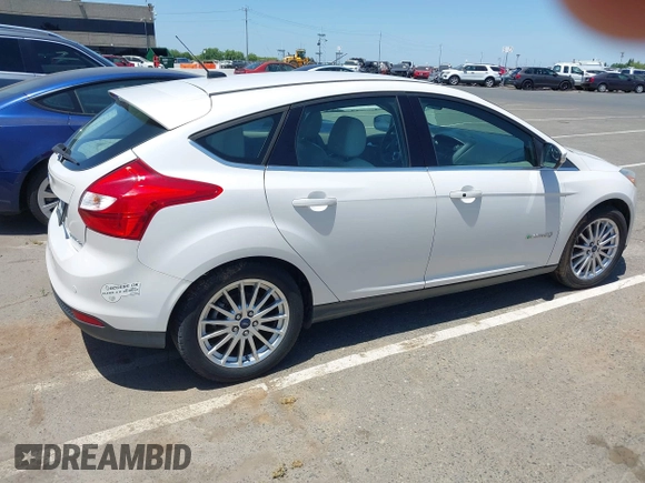 2014 Ford Focus Electric with VIN 1FADP3R45EL306109, listed as a IAAI auction lot 42382079 with 80,143 mi miles and . Bid and sale history available at DreamBid. Image 4.