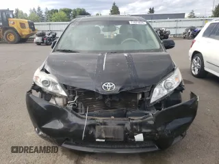 2011 Toyota Sienna XLE with VIN 5TDDK3DC1BS022039, listed as a Copart auction lot 71971634 with 121,100 mi miles and Salvage Title. Bid and sale history available at carsss.com. Image 5.