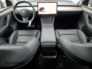 2023 Tesla Model Y Long Range with VIN 7SAYGDEE1PA150771, listed as a Copart auction lot 81805194 with 23,718 mi miles and Salvage Title. Bid and sale history available at DreamBid. Image 8.