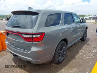 2022 Dodge Durango GT Plus with VIN 1C4RDJDG1NC213263, listed as a IAAI auction lot 42639103 with 77,061 mi miles and . Bid and sale history available at DreamBid. Image 4.