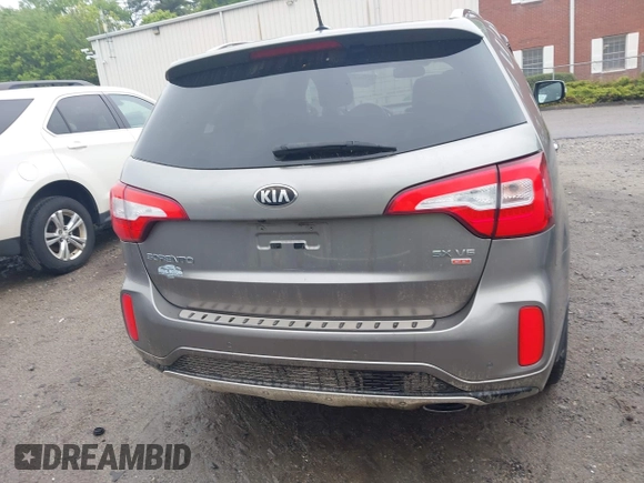 2014 Kia Sorento SX z VIN 5XYKWDA70EG478463, wystawiony jako IAAI lot #42251435 z przebiegiem 102 638 mil mil oraz . Historia ofert i sprzedaży dostępna na DreamBid. Obrazek 16.