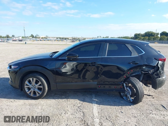 2023 Mazda CX-30 S Select with VIN 3MVDMBBM9PM508958, listed as a IAAI auction lot 42009029 with 21,219 mi miles and . Bid and sale history available at DreamBid. Image 15.