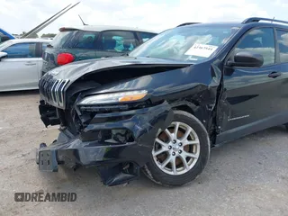 2016 Jeep Cherokee Sport with VIN 1C4PJLAB5GW297349, listed as a IAAI auction lot 42367544 with 142,930 mi miles and . Bid and sale history available at DreamBid. Image 6.