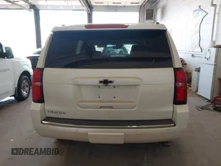 2015 Chevrolet Tahoe LTZ with VIN 1GNSKCKC9FR123996, listed as a IAAI auction lot 42113435 with 149,825 mi miles and . Bid and sale history available at DreamBid. Image 16.