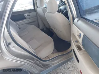 2002 Ford Taurus LX with VIN 1FAFP52U72G284116, listed as a IAAI auction lot 42004075 with 86,544 mi miles. Bid and sale history available at carsss.com. Image 8.