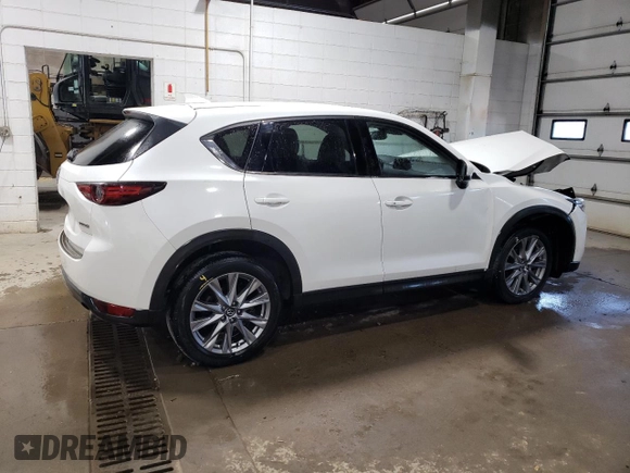 2020 Mazda CX-5 Grand Touring with VIN JM3KFBDM5L1851734, listed as a Copart auction lot 56729585 with 39,023 mi miles and Salvage title. Bid and sale history available at DreamBid. Image 3.
