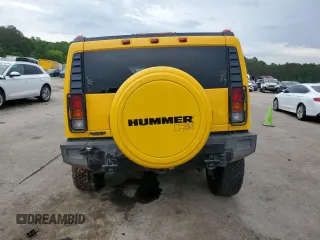 2003 Hummer H2 z VIN 5GRGN23U73H146894, wystawiony jako Copart lot #53449905 z przebiegiem 153 870 mil mil oraz Szkoda całkowita • Salvage title. Historia ofert i sprzedaży dostępna na DreamBid. Obrazek 6.