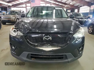 2014 Mazda CX-5 Sport с VIN JM3KE2BE0E0367493, выставлен на аукционе Copart как лот 57324195 с пробегом 103 367 миль миль и Списание • Salvage title. История ставок и продаж доступна на DreamBid. Изображение 5.