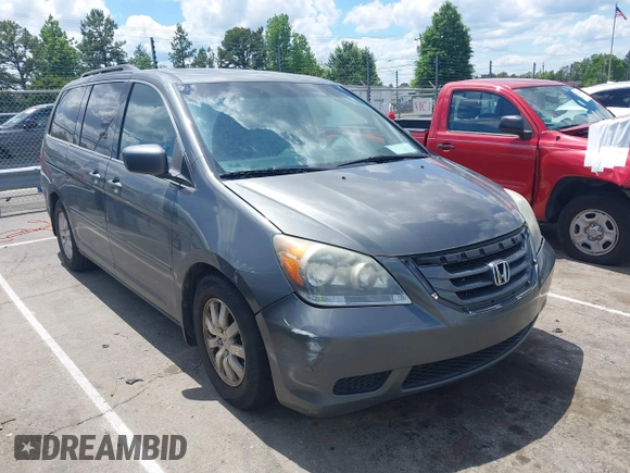 2008 Honda Odyssey EX-L z VIN 5FNRL38798B103173, wystawiony jako IAAI lot #42186360 z przebiegiem 207 341 mil mil oraz . Historia ofert i sprzedaży dostępna na DreamBid. Obrazek 1.