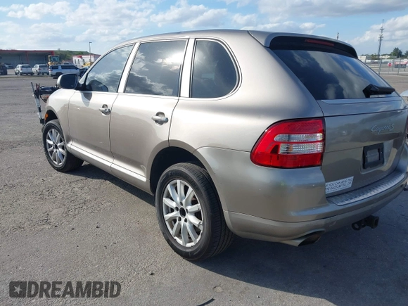 2005 Porsche Cayenne S with VIN WP1AB29P75LA61263, listed as a IAAI auction lot 41635350 with 242,874 mi miles. Bid and sale history available at carsss.com. Image 3.