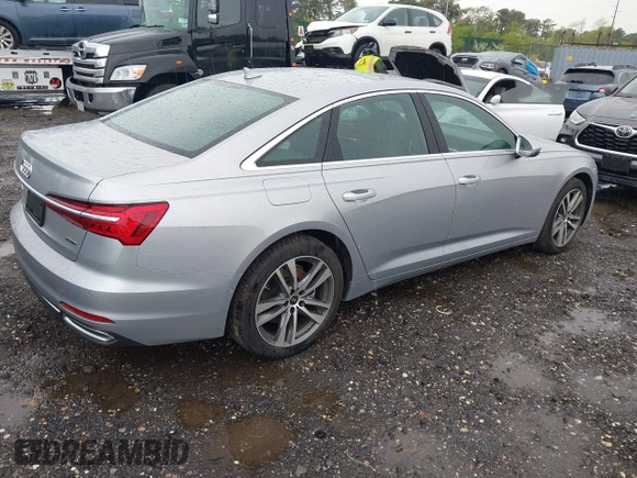 2023 Audi A6 Premium z VIN WAUD3BF27PN068058, wystawiony jako IAAI lot #42179522 z przebiegiem 7 869 mil mil oraz . Historia ofert i sprzedaży dostępna na DreamBid. Obrazek 4.