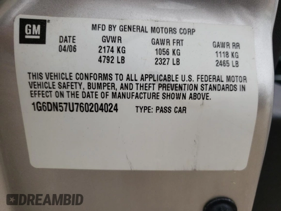 2006 Cadillac CTS-V z VIN 1G6DN57U760204024, wystawiony jako Copart lot #55496974 z przebiegiem 117 916 mil mil oraz Szkoda całkowita • Salvage title. Historia ofert i sprzedaży dostępna na DreamBid. Obrazek 13.