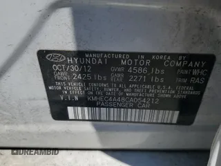 2012 Hyundai Sonata Hybrid with VIN KMHEC4A48CA054212, listed as a Copart auction lot 56938545 with Not provided miles and Salvage title. Bid and sale history available at DreamBid. Image 12.