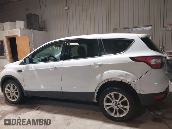 2017 Ford Escape SE with VIN 1FMCU0GD9HUC95707, listed as a IAAI auction lot 41876949 with 125,651 mi miles and . Bid and sale history available at carsss.com. Image 15.
