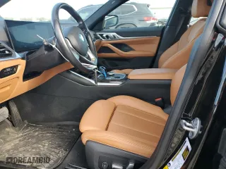 2022 BMW i4 eDrive40 with VIN WBY73AW02NFN11747, listed as a Copart auction lot 51413995 with 25,821 mi miles and Salvage Title. Bid and sale history available at carsss.com. Image 7.