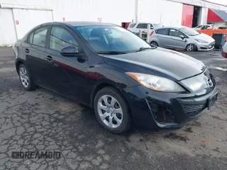 2011 Mazda Mazda3 i Sport with VIN JM1BL1UG5B1459907, listed as a IAAI auction lot 41724612 with 154,008 mi miles. Bid and sale history available at carsss.com. Image 1.