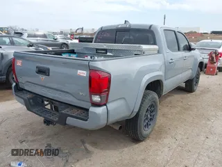 2021 Toyota Tacoma 4WD SR with VIN 5TFCZ5AN3MX260853, listed as a IAAI auction lot 41784451 with 122,244 mi miles. Bid and sale history available at carsss.com. Image 4.