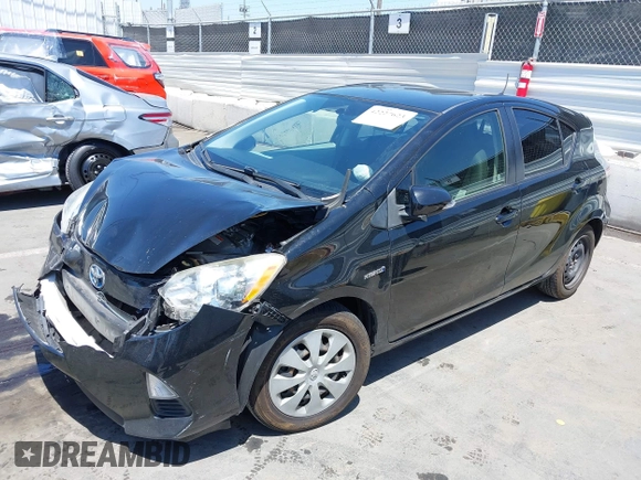 2012 Toyota Prius One z VIN JTDKDTB33C1017704, wystawiony jako IAAI lot #42227623 z przebiegiem 116 058 mil mil oraz . Historia ofert i sprzedaży dostępna na DreamBid. Obrazek 17.
