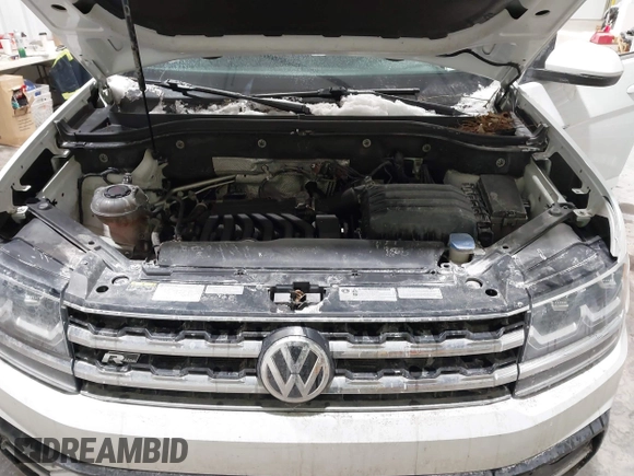 2019 Volkswagen Atlas SE z VIN 1V2XR2CA0KC595596, wystawiony jako IAAI lot #41410019 z przebiegiem 103 336 mil mil oraz . Historia ofert i sprzedaży dostępna na DreamBid. Obrazek 10.