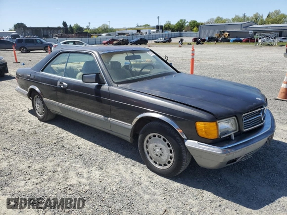 1987 Mercedes-Benz 560 with VIN WDBCA45D3HA358923, listed as a Copart auction lot 52143895 with 127,974 mi miles and Clean Title. Bid and sale history available at DreamBid. Image 4.