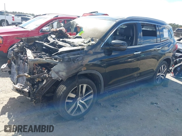 2016 Honda Pilot Elite with VIN 5FNYF6H0XGB127133, listed as a IAAI auction lot 41723875 with Not Provided miles. Bid and sale history available at carsss.com. Image 17.