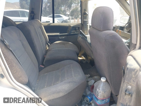 1997 Jeep Grand Cherokee Laredo z VIN 1J4GZ58S4VC720943, wystawiony jako IAAI lot #42648807 z przebiegiem 231 203 mil mil oraz . Historia ofert i sprzedaży dostępna na DreamBid. Obrazek 8.