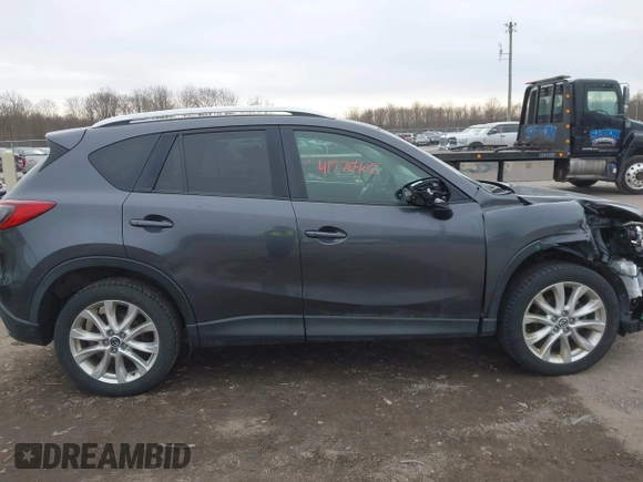 2014 Mazda CX-5 Grand Touring with VIN JM3KE4DY4E0343863, listed as a IAAI auction lot 41770402 with 117,615 mi miles. Bid and sale history available at carsss.com. Image 13.