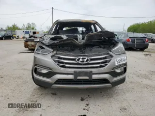 2017 Hyundai Santa Fe 2.4L z VIN 5NMZUDLB0HH042101, wystawiony jako Copart lot #55058145 z przebiegiem Nie podano mil oraz Szkoda całkowita • Salvage title. Historia ofert i sprzedaży dostępna na DreamBid. Obrazek 5.