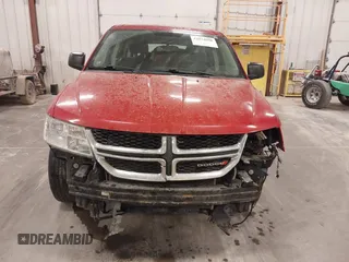 2015 Dodge Journey American Value z VIN 3C4PDCAB5FT720300, wystawiony jako IAAI lot #42074690 z przebiegiem 144 690 mil mil oraz . Historia ofert i sprzedaży dostępna na DreamBid. Obrazek 6.