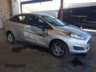 2018 Ford Fiesta SE with VIN 3FADP4BJXJM138126, listed as a IAAI auction lot 42006057 with 188,156 mi miles. Bid and sale history available at carsss.com. Image 1.