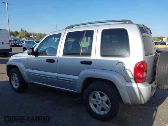 2003 Jeep Liberty Limited z VIN 1J8GL58K73W694818, wystawiony jako IAAI lot #42032227 z przebiegiem 217 446 mil mil oraz . Historia ofert i sprzedaży dostępna na DreamBid. Obrazek 14.