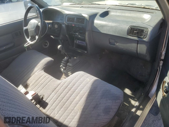 1996 Nissan Frontier XE z VIN 1N6SD11Y5TC327761, wystawiony jako Copart lot #79662594 z przebiegiem 151 631 mil mil oraz Szkoda całkowita • Salvage title. Historia ofert i sprzedaży dostępna na DreamBid. Obrazek 8.