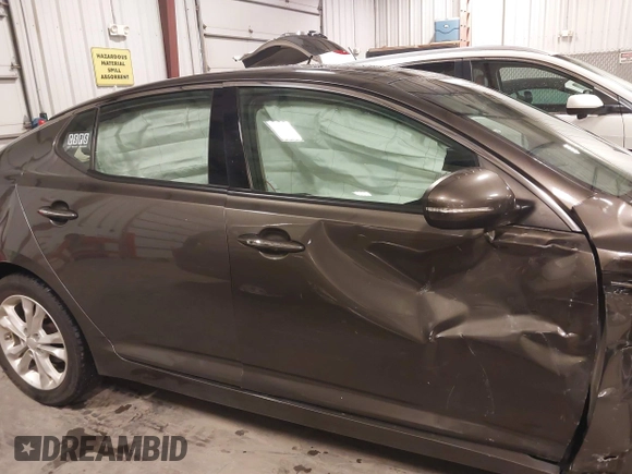 2013 Kia Optima EX with VIN 5XXGN4A72DG120129, listed as a IAAI auction lot 41858461 with 138,627 mi miles. Bid and sale history available at carsss.com. Image 13.
