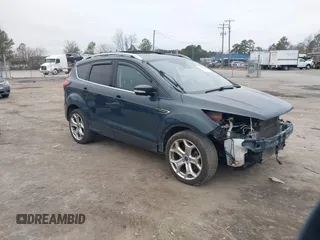 2019 Ford Escape Titanium with VIN 1FMCU9J93KUB84831, listed as a IAAI auction lot 41514146 with 105,072 mi miles. Bid and sale history available at carsss.com. Image 1.