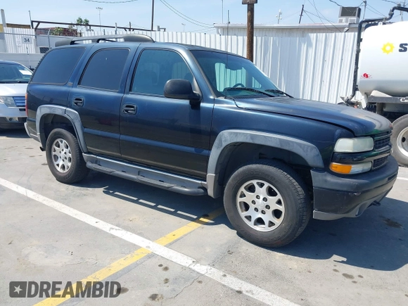 2001 Chevrolet Tahoe LT with VIN 1GNEK13T41R197657, listed as a IAAI auction lot 42164367 with 200,507 mi miles. Bid and sale history available at carsss.com. Image 1.