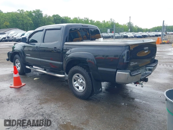 2011 Toyota Tacoma with VIN 3TMLU4EN9BM058136, listed as a IAAI auction lot 42470638 with 143,074 mi miles and . Bid and sale history available at DreamBid. Image 3.