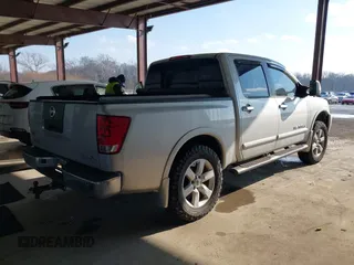 2011 Nissan Titan SL with VIN 1N6AA0EC7BN306488, listed as a IAAI auction lot 41413618 with 102,465 mi miles. Bid and sale history available at carsss.com. Image 4.