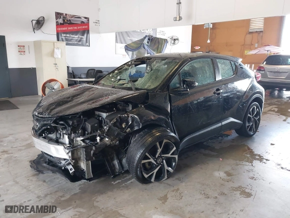 2019 Toyota C-HR XLE with VIN NMTKHMBX9KR078696, listed as a IAAI auction lot 39827333 with 27,840 mi miles. Bid and sale history available at carsss.com. Image 18.