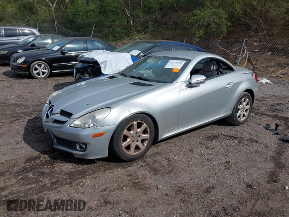 2009 Mercedes-Benz SLK-Class 3.0L with VIN WDBWK54F69F190007, listed as a IAAI auction lot 41775603 with 131,703 mi miles. Bid and sale history available at carsss.com. Image 2.