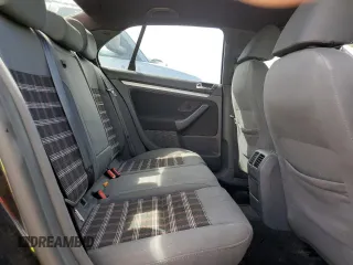 2009 Volkswagen Jetta GLI z VIN 3VWBJ71K19M071374, wystawiony jako Copart lot #77714284 z przebiegiem 61 434 mil mil oraz Szkoda całkowita • Salvage title. Historia ofert i sprzedaży dostępna na DreamBid. Obrazek 10.