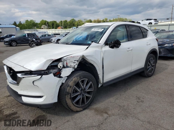 2018 Mazda CX-5 Grand Touring z VIN JM3KFBDM6J0447165, wystawiony jako Copart lot #56133015 z przebiegiem 80 579 mil mil oraz Szkoda całkowita • Salvage title. Historia ofert i sprzedaży dostępna na DreamBid. Obrazek 1.
