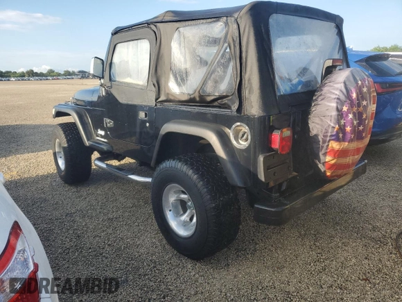 2003 Jeep Wrangler X with VIN 1J4FA39S73P340698, listed as a Copart auction lot 73888624 with 49,677 mi miles and Salvage Title. Bid and sale history available at carsss.com. Image 2.